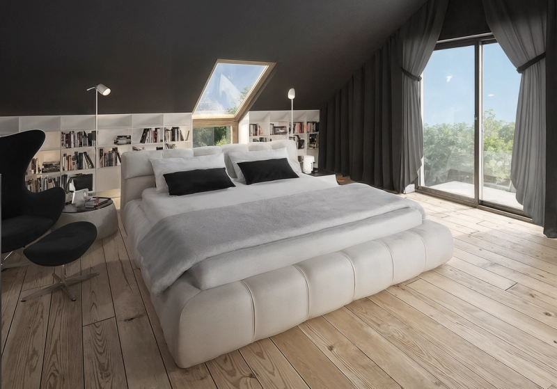 W tej sypialni niskie skosy wykorzystałam na biblioteczkę. Łóżko postawiłam na środku pomieszczenia, dzięki czemu można swobodnie dojść do niego z obu stron. Sypialnia w domu w Lusinie.