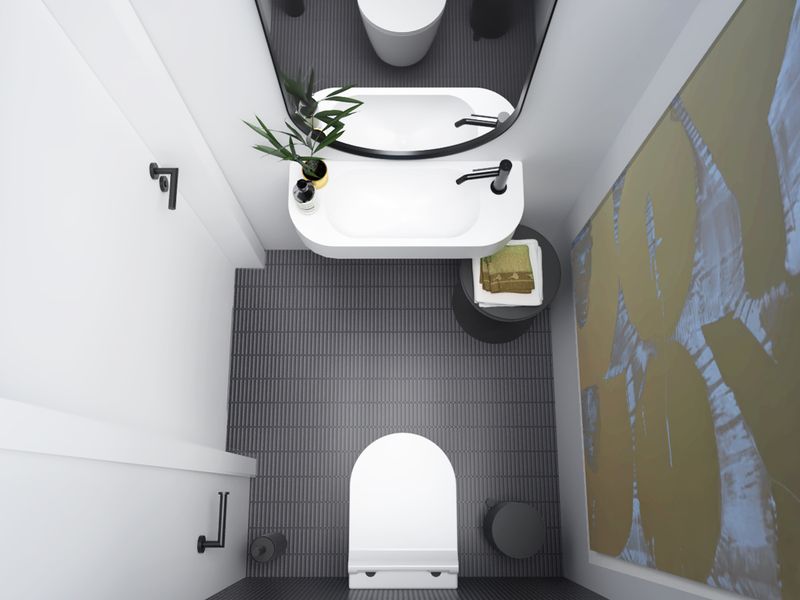 Nowoczesna łazienka z walk-in prysznicem, białą umywalką, szarymi płytkami i czarną armaturą w minimalistycznym stylu