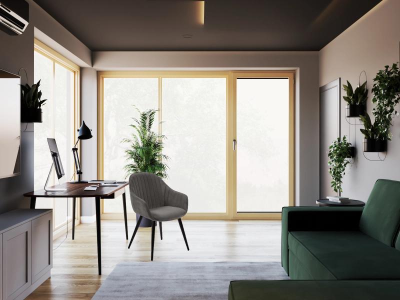 Widok z sofy. Narożne przeszklenia, ogród, rośliny.