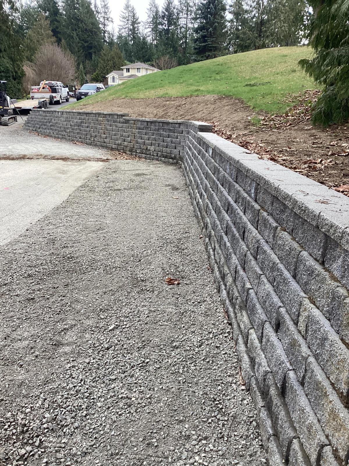 A new stack stone wall installed in Graham, WA by FTS Excavation.