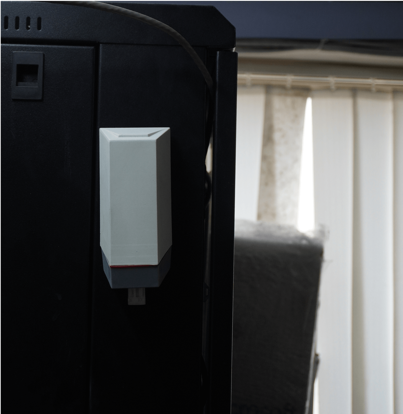 LoRaWAN AQI sensor installed in office ceiling for indoor air quality monitoring