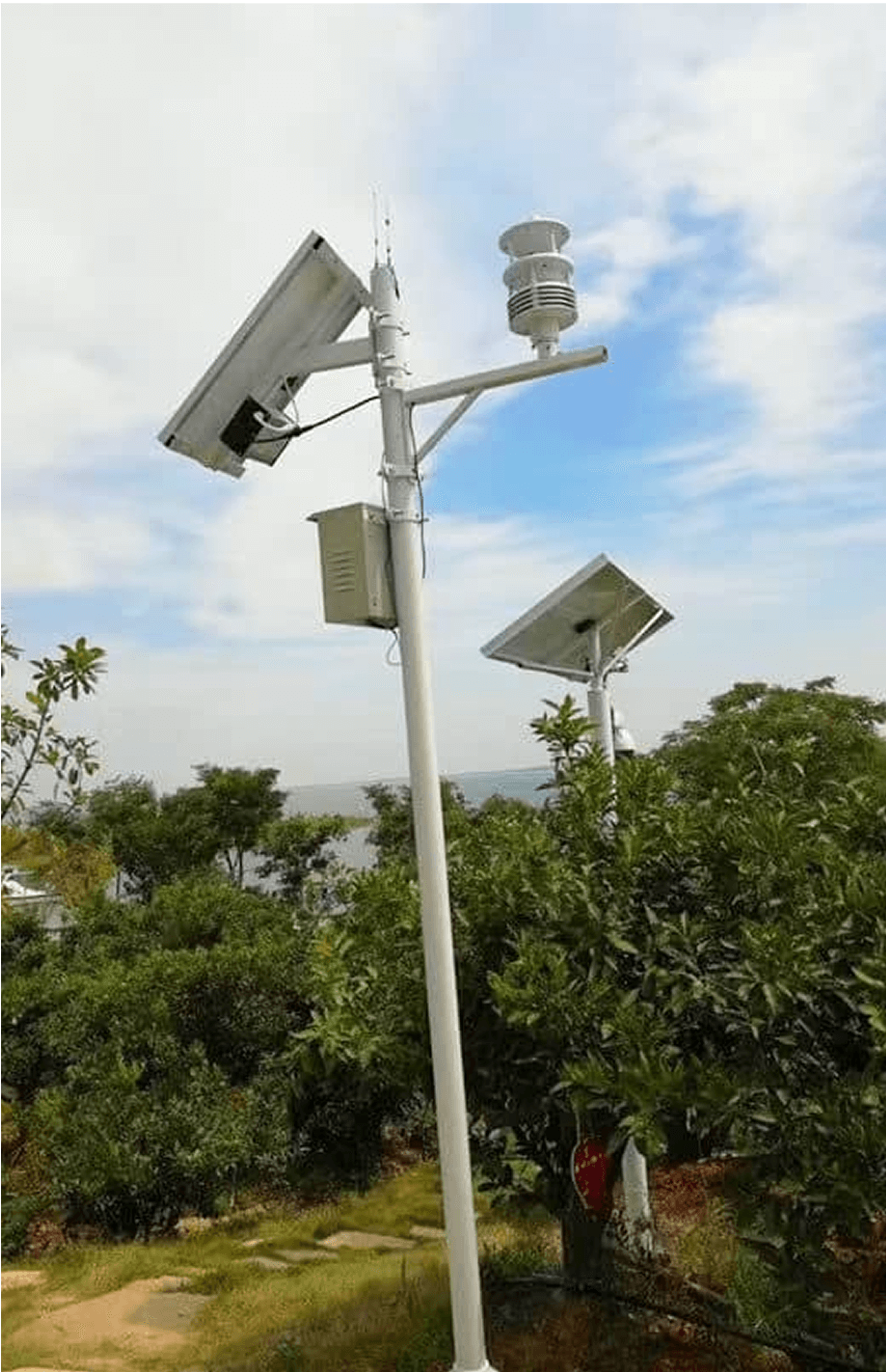 Industrial outdoor air quality sensor mounted on pole for AQI compliance and worker safety tracking