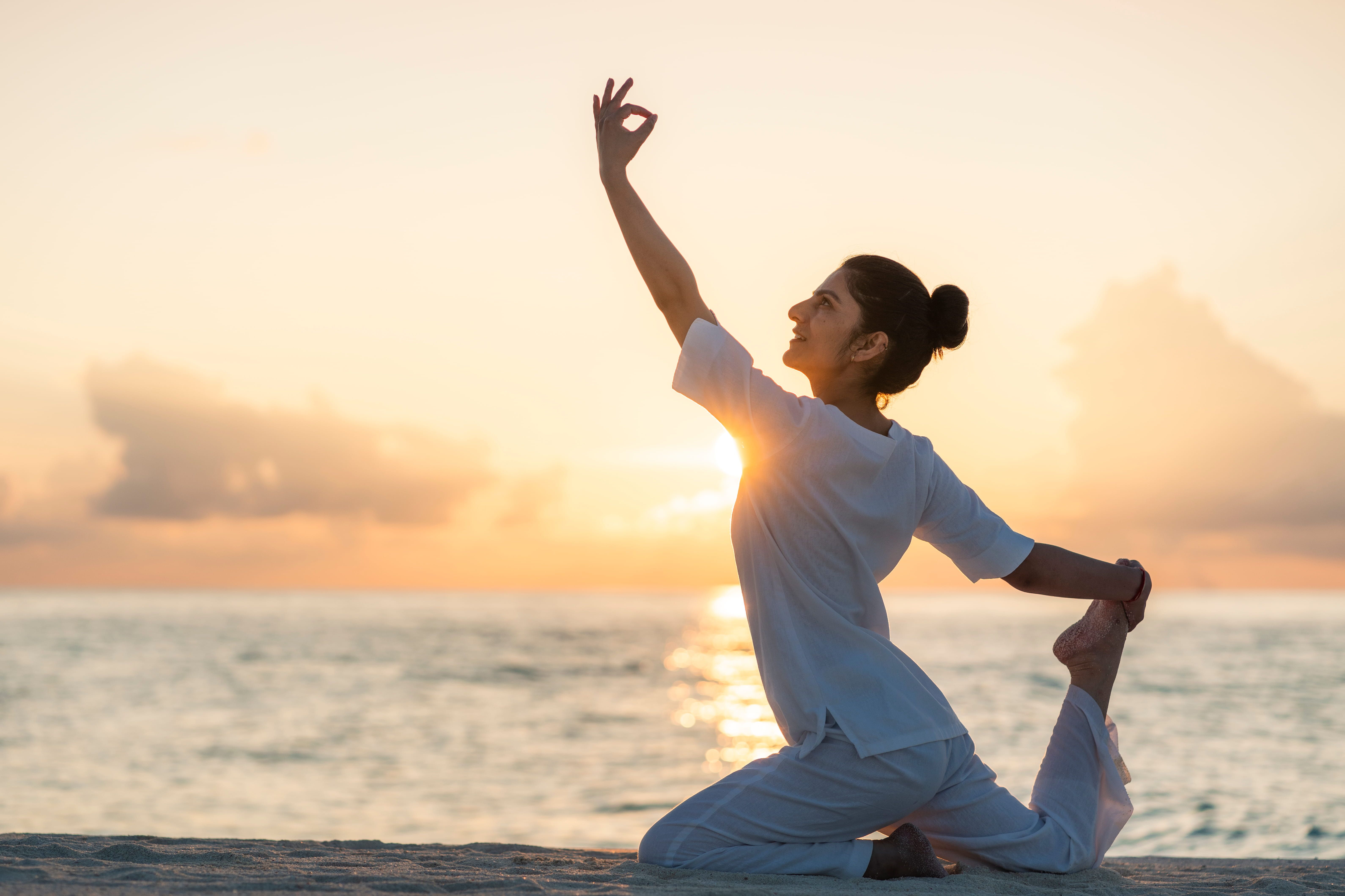 Sunrise Yoga at Fushifaru Maldives