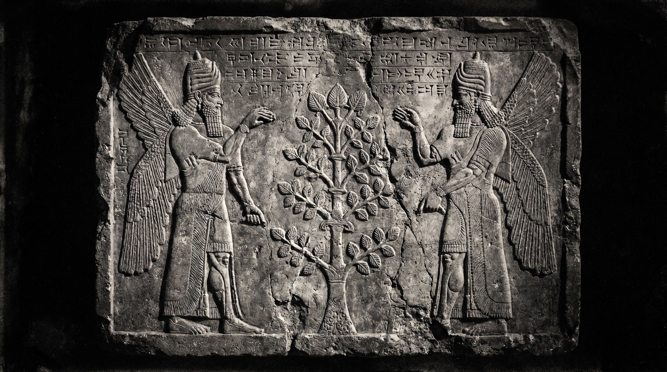 Illustration: a Sumerian-style stone relief with winged figures and cuneiform marks
