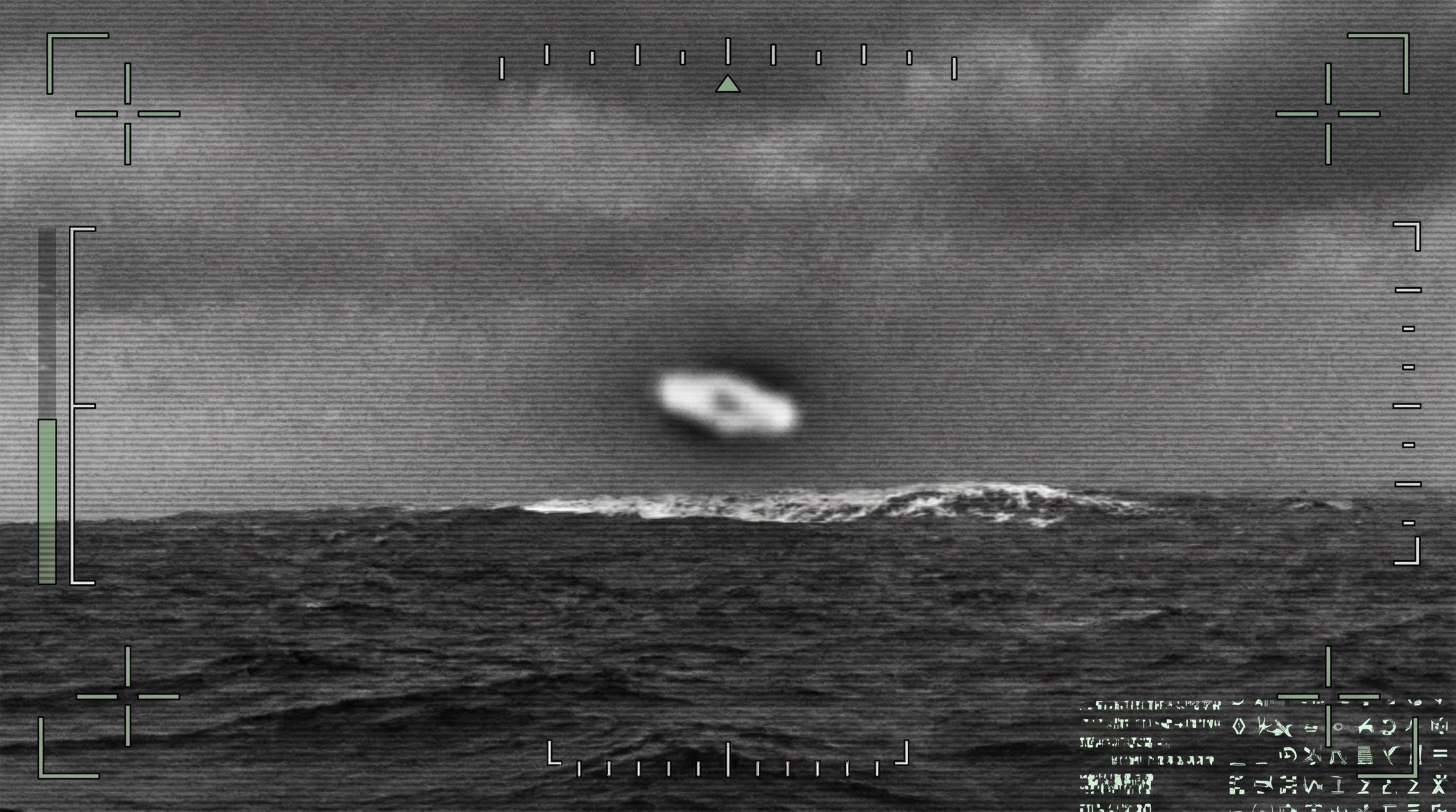 Illustration: an infrared sensor view of a small oblong object above the Pacific