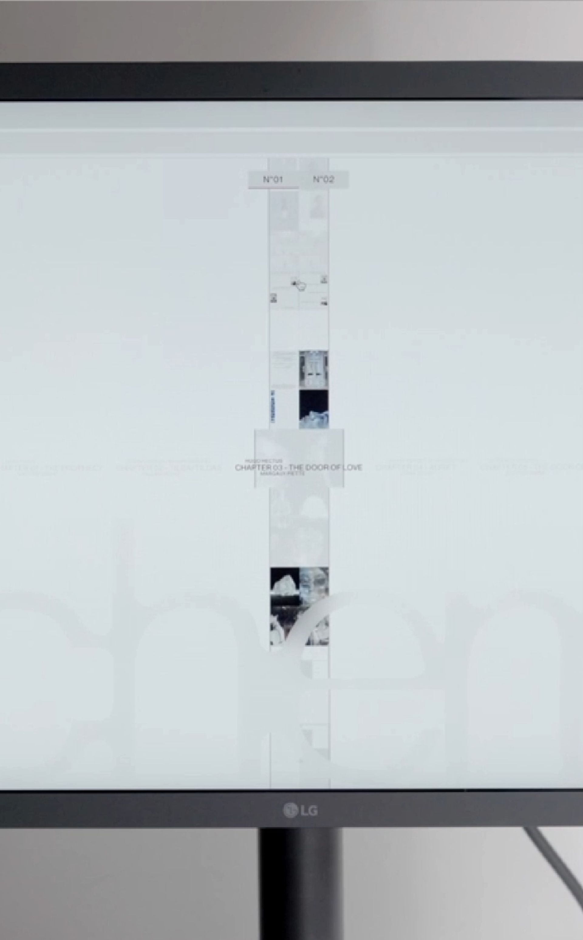Video still of an LG monitor showing Schema Magazine's vertical chemin-de-fer strip at Chapter 03 - The Door of Love, with the Schema wordmark behind.