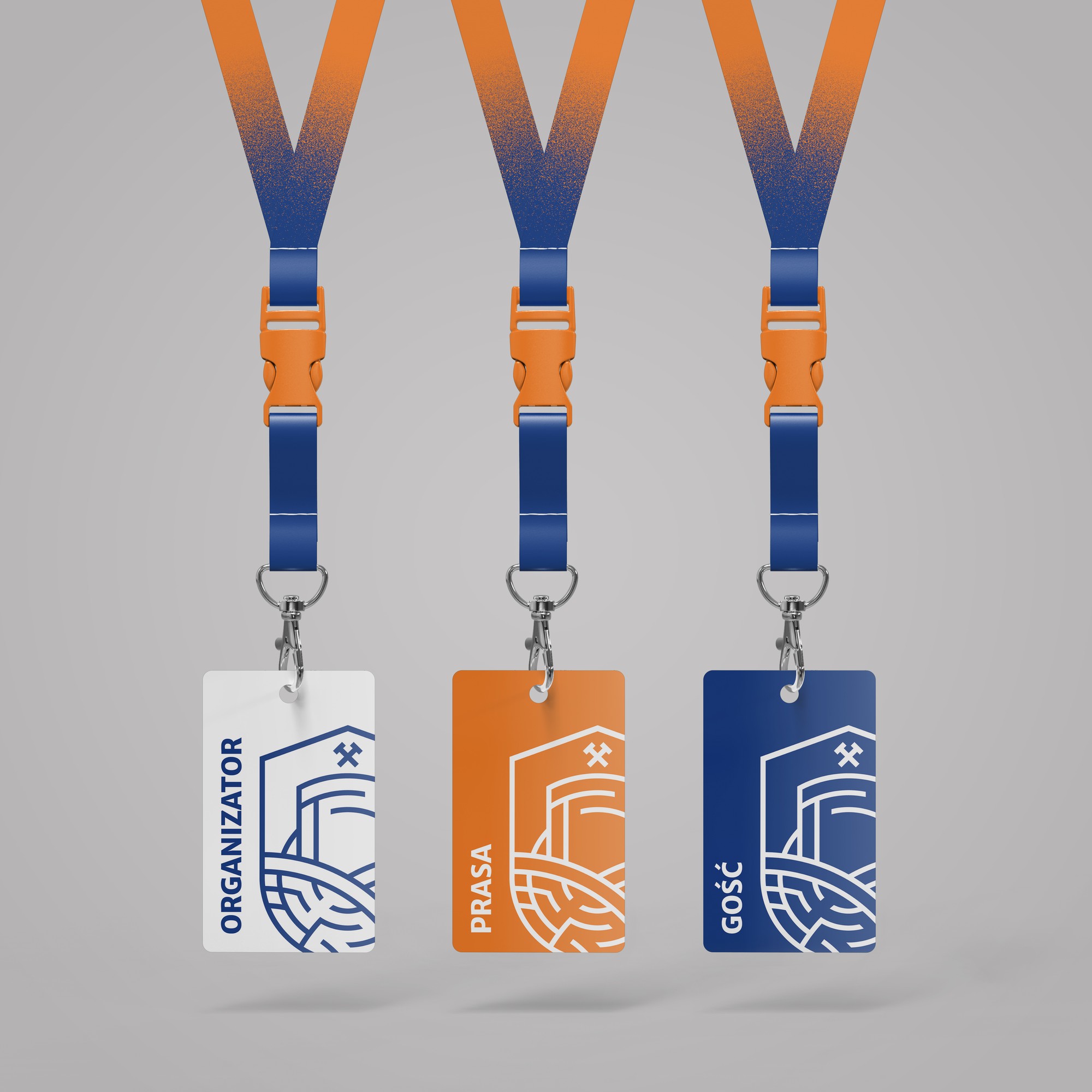 Three lanyards with badges: white “Organiser”, orange “Press”, navy “Guest”