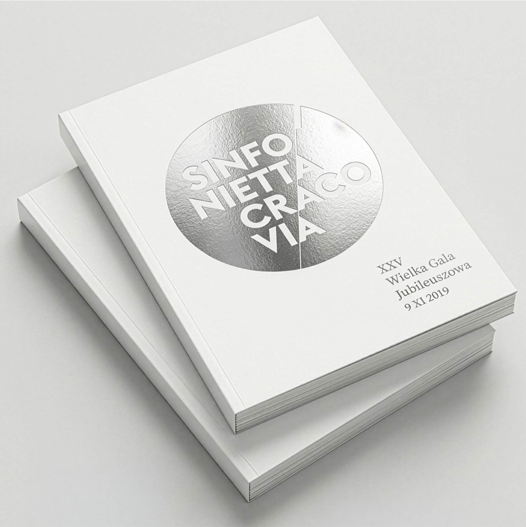The 25th-anniversary gala catalogue with silver foil
