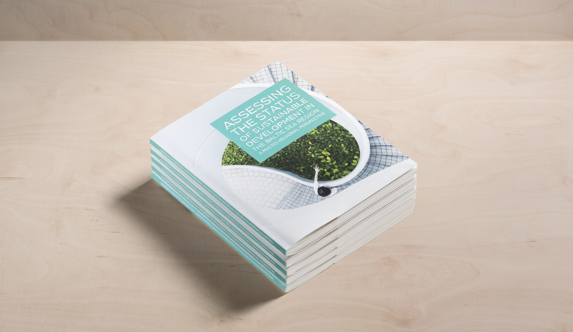 Annual reports stacked in a pile