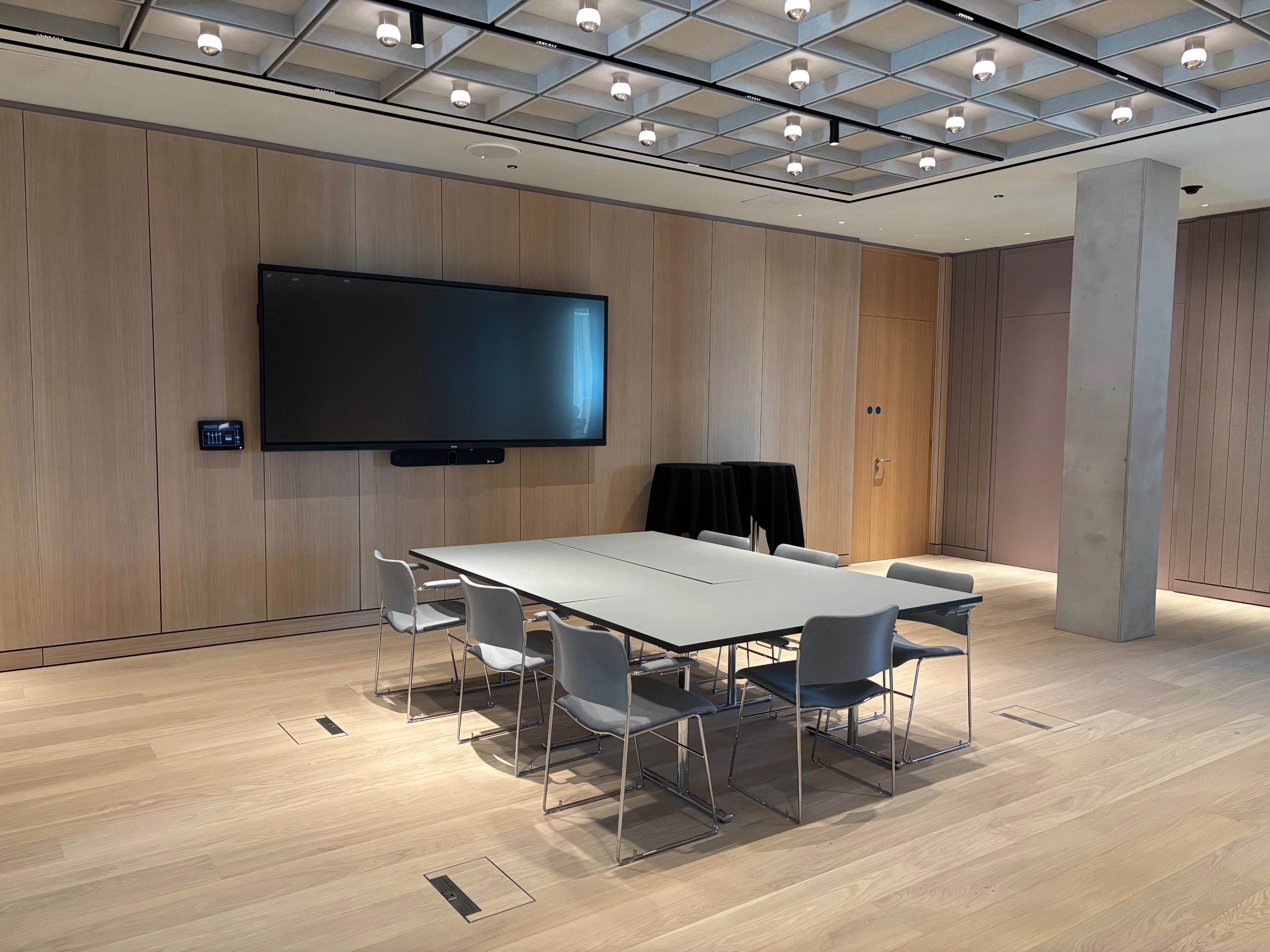 Seminar Room B at Oxford North, set up as a board room