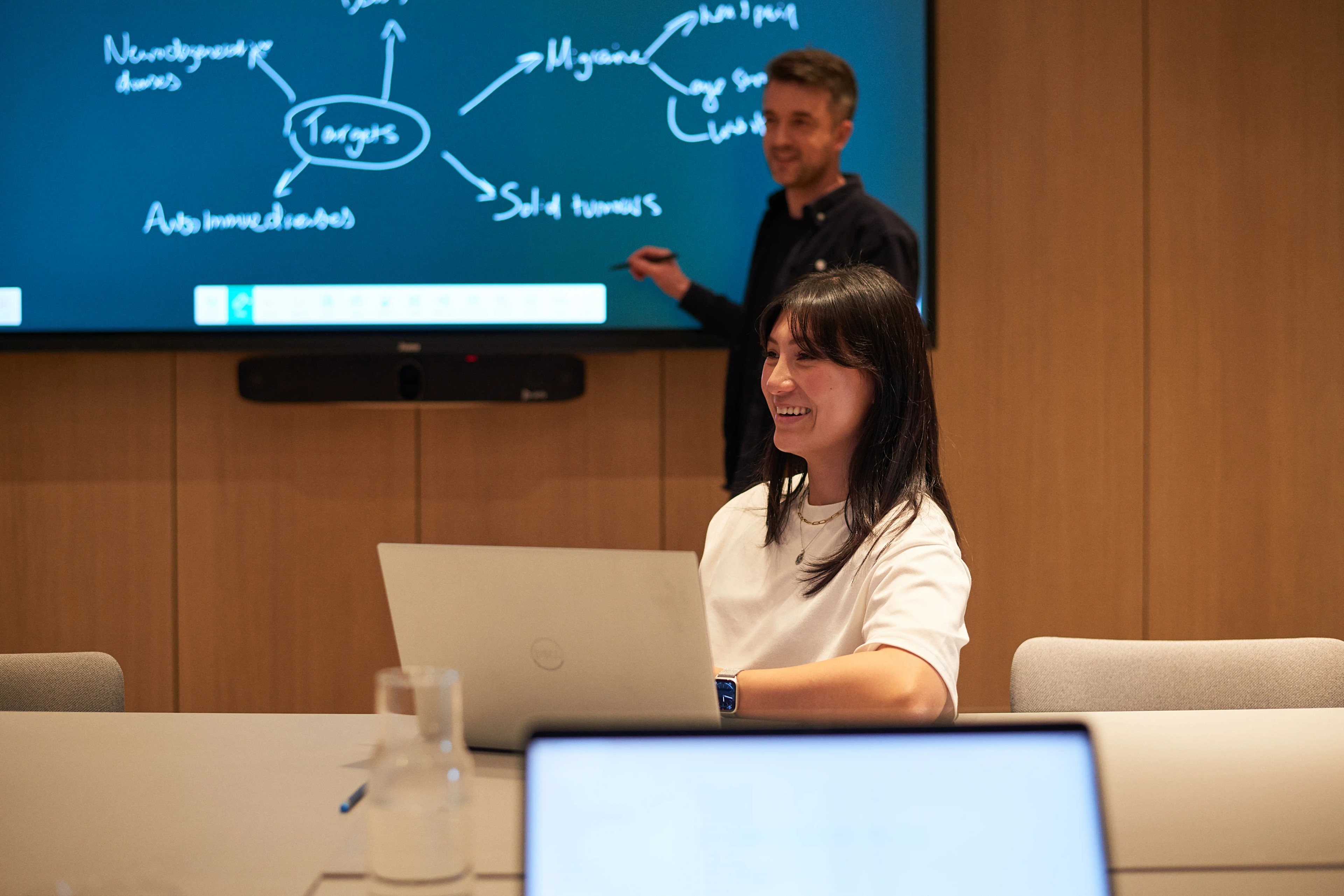A team hosts their presentation at Oxford North