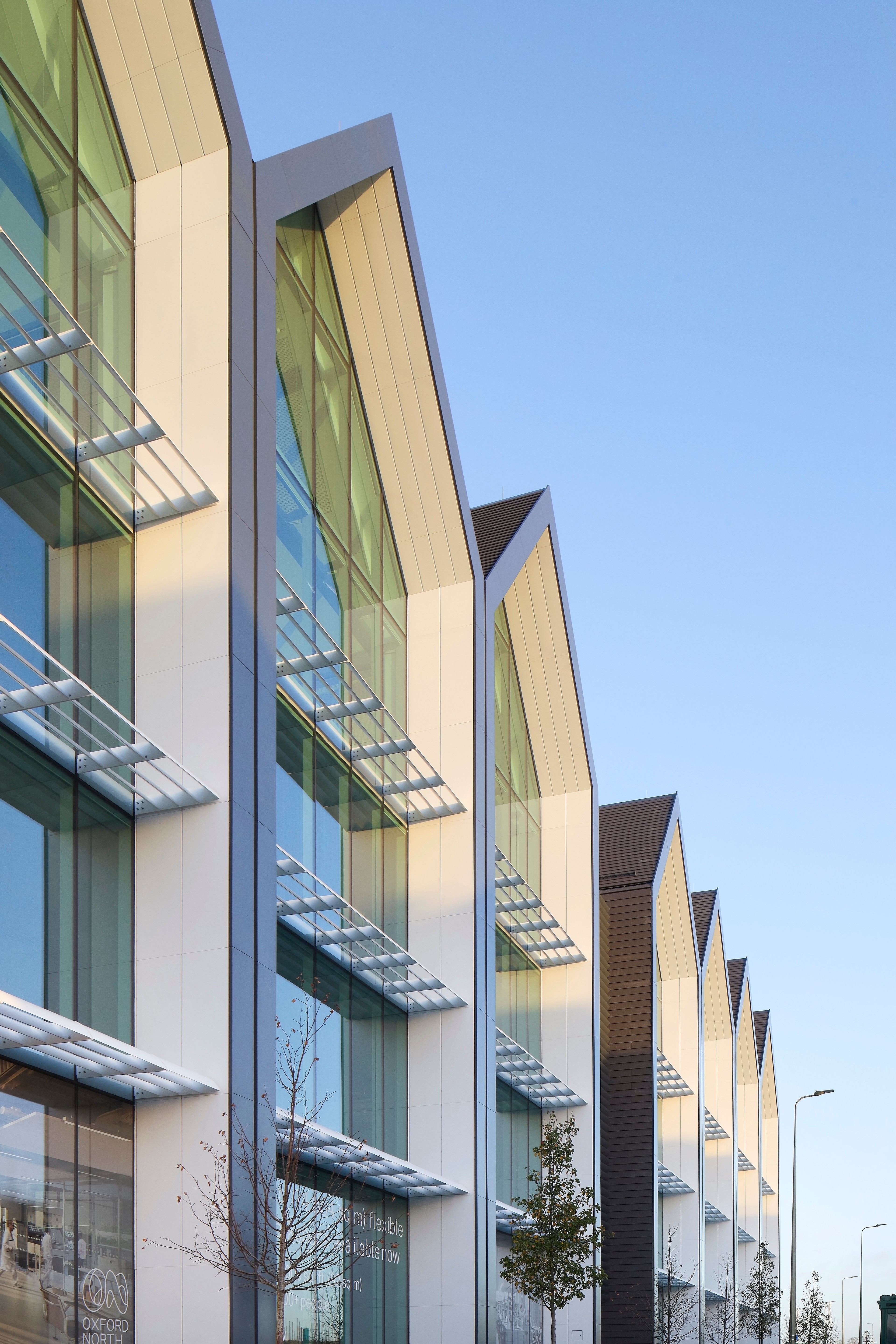 The gabled glass façade of 2 Fallaize Street
