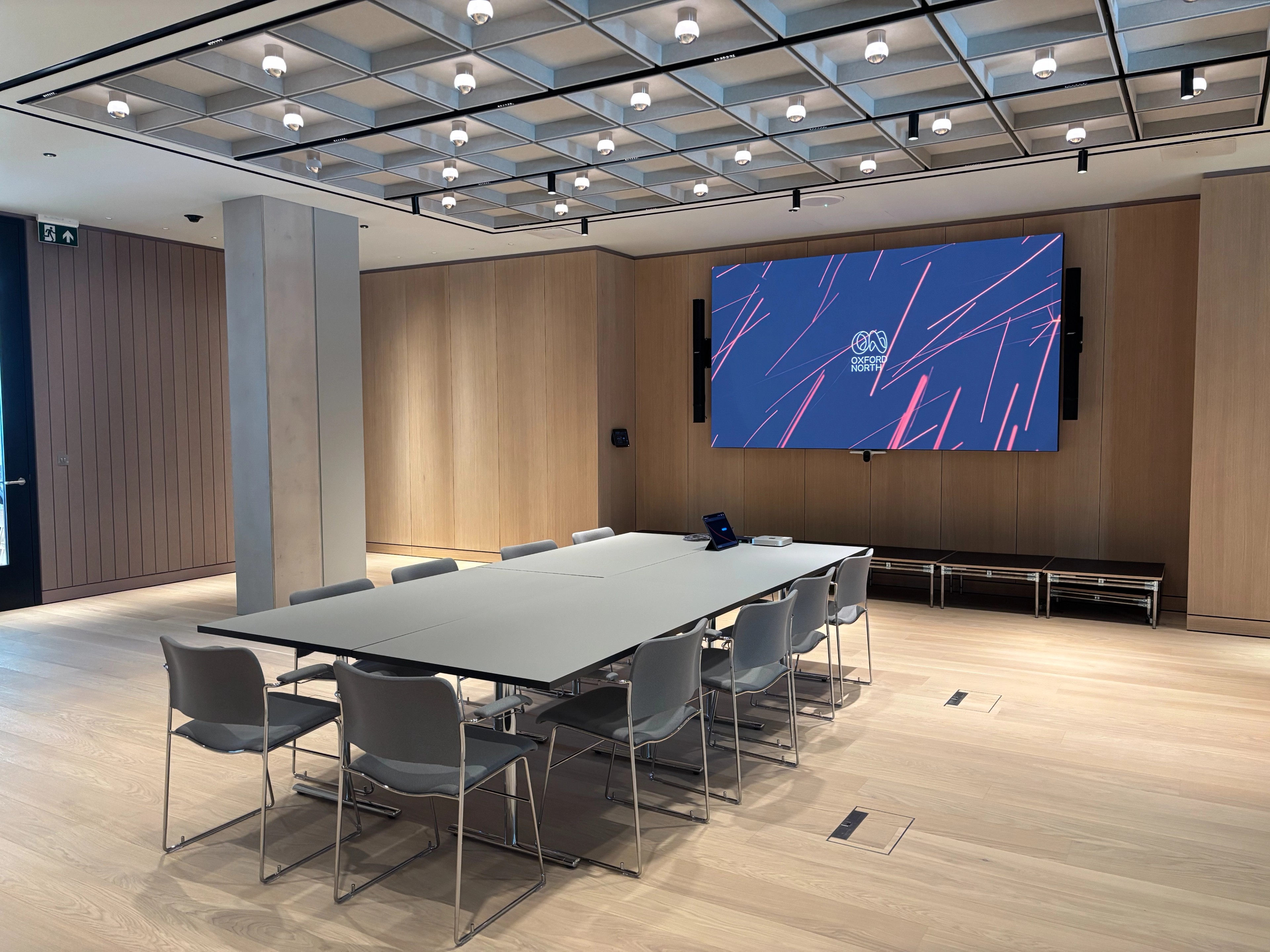 Seminar Room A at Oxford North, set up as a board room