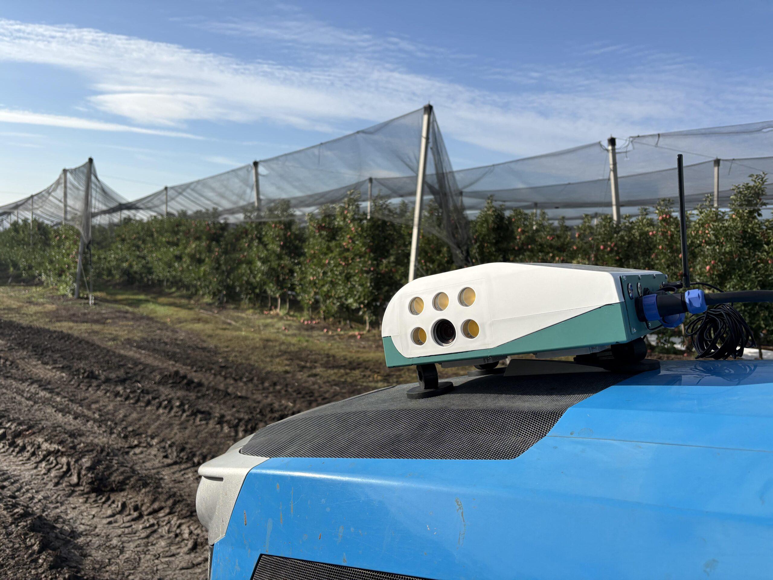Viewer device on a blue tractor during field monitoring