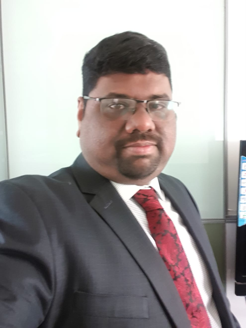 Portrait of counsellor Benoy John Koshy