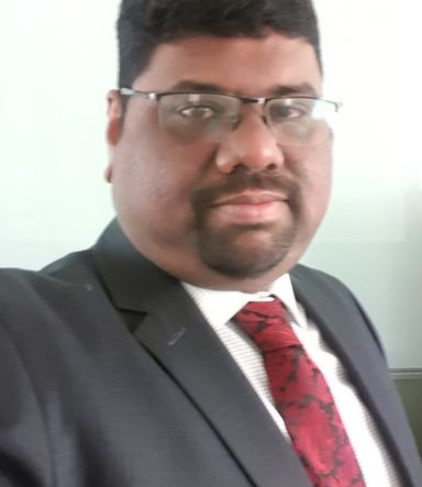 Portrait of counsellor Benoy John Koshy