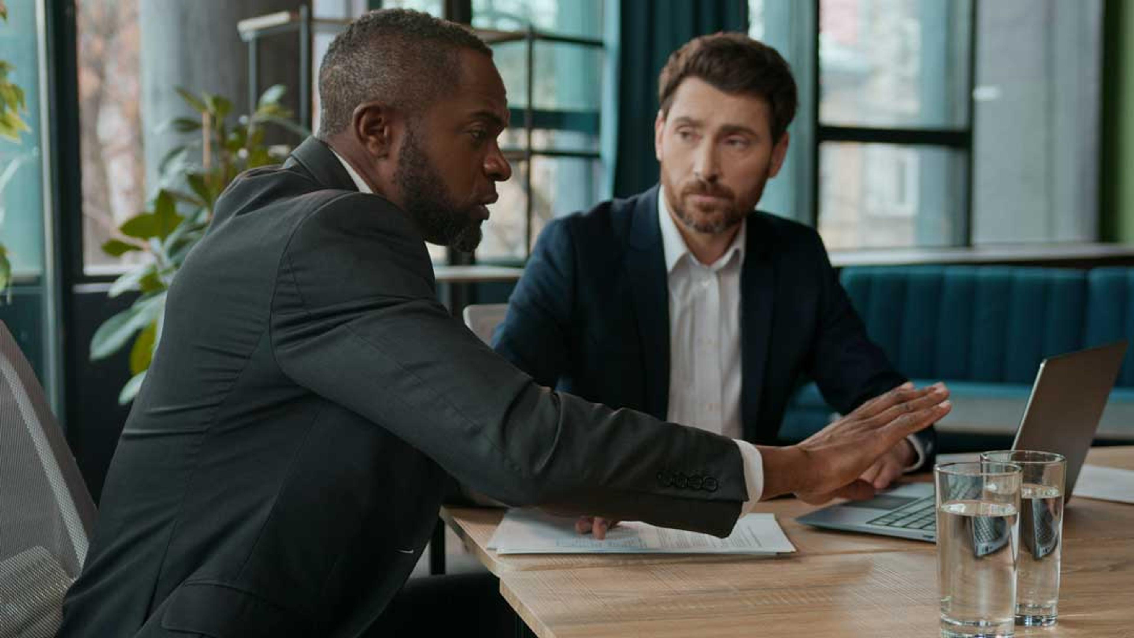 Business leader showing a client Microsoft Marketplace analytics