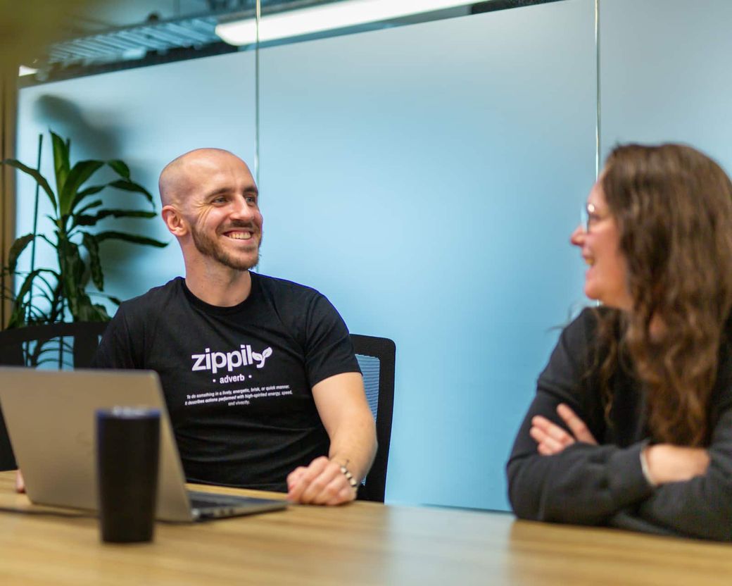 Zippily team members in conversation
