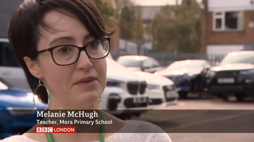 Image of BBC presenter introducing the news