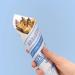 A photograph of our Fish n Chips prepared in a traditional newspaper chip cone