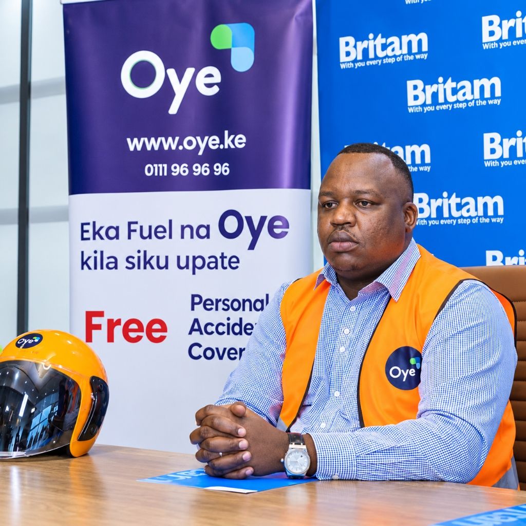 Kevin Mutiso, founder of Oye, seated in rider safety gear