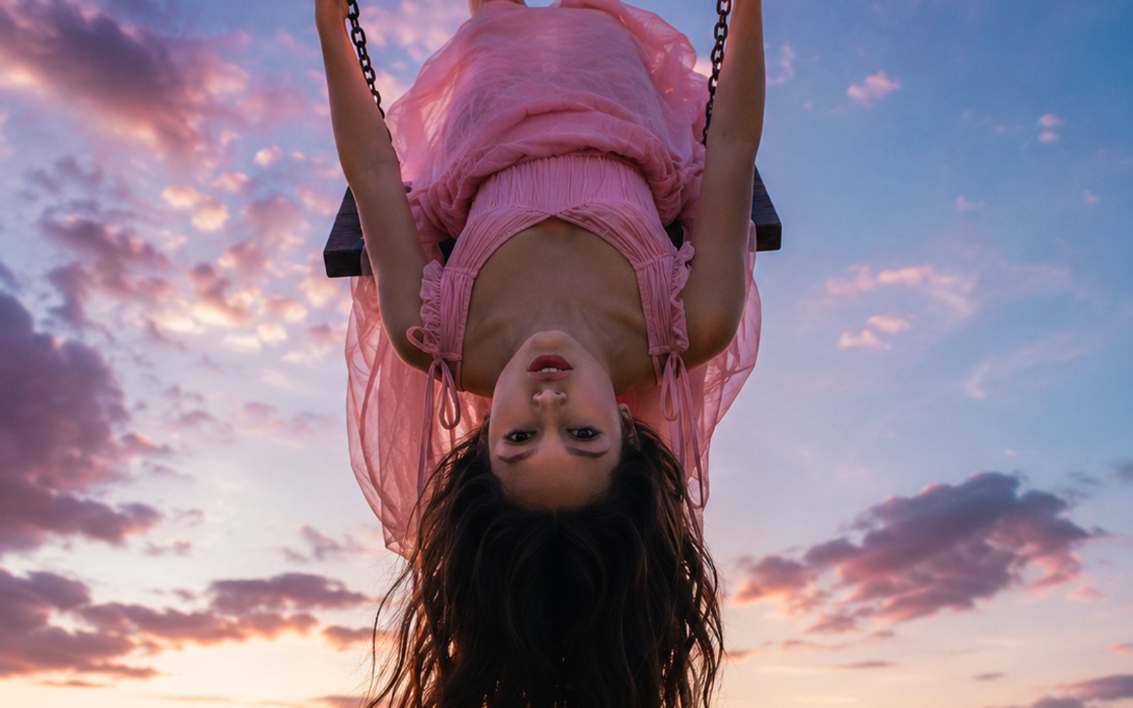 Olivia Rodrigo Hangs Upside Down. Pop Music Tilts Off Its Axis.