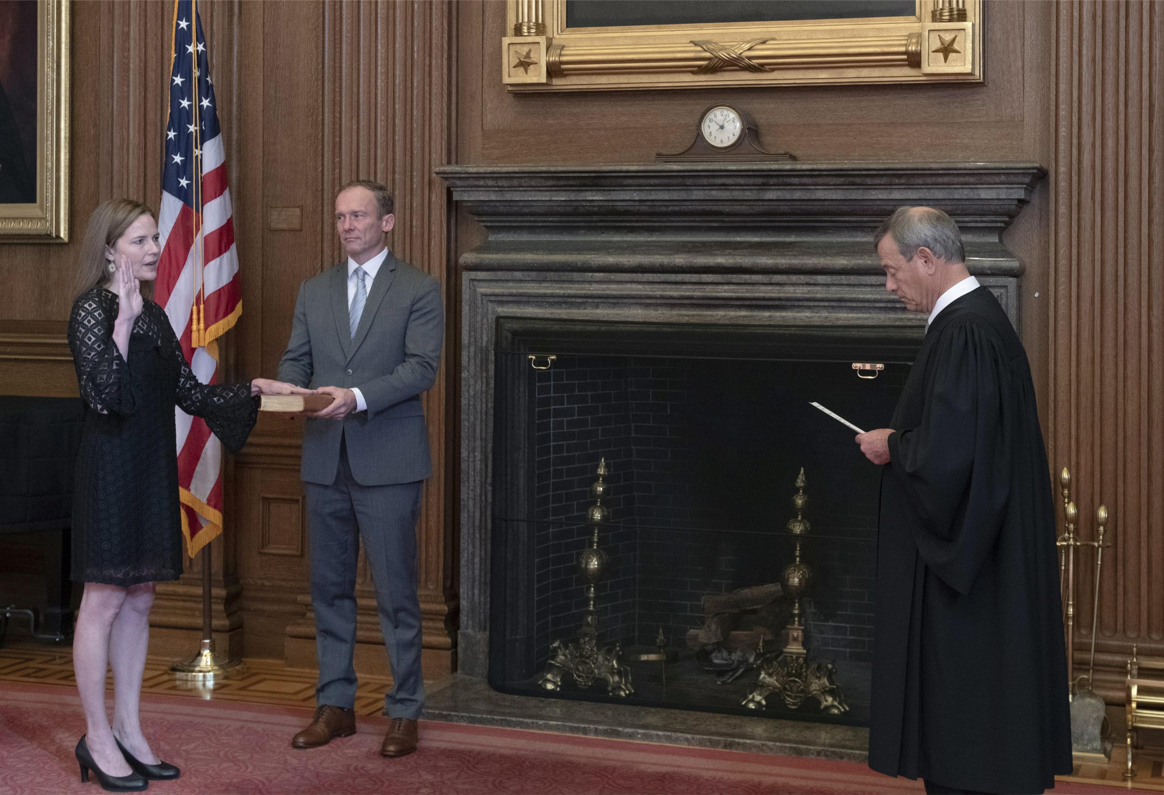 Barrett sworn in as newest justice as court weighs urgent election cases