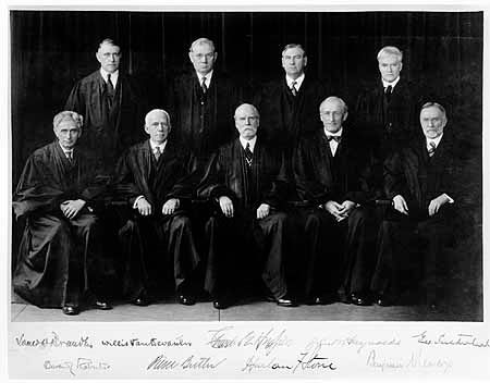 Front row: Justices Brandeis and Van Devanter, Chief Justice Hughes, and Justices McReynolds and Sutherland. Back row: Justices Roberts, Butler, Stone, and Cardozo.