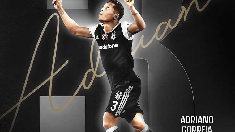 Beşiktaş forması giyen bir futbolcu, iki elini havaya kaldırarak poz veriyor; görselde Adriano Correia yazısı bulunuyor.
