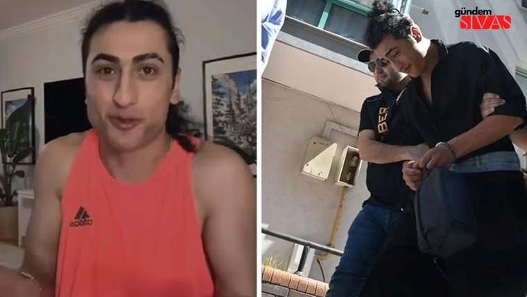Kırmızı tişörtlü bir kişi, kameraya konuşurken; yanında gözaltına alınan bir kişi, polis tarafından götürülüyor.