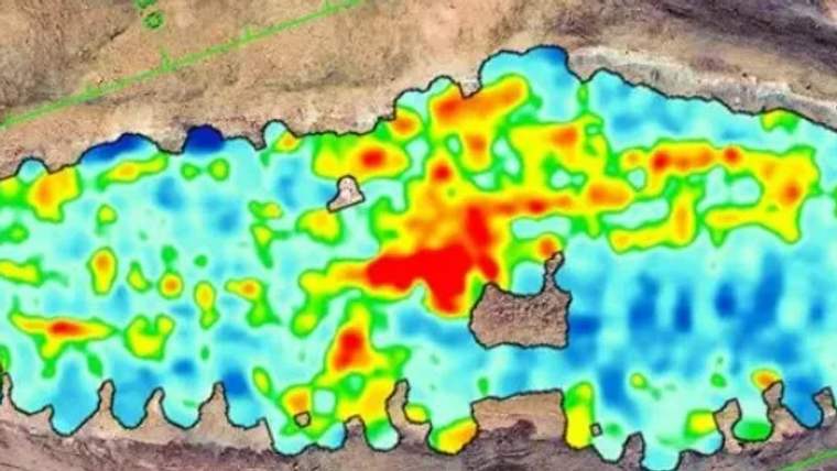 Renkli harita üzerinde arkeolojik alanların sıcaklık ve yoğunluk dağılımını gösteren bir görüntü.