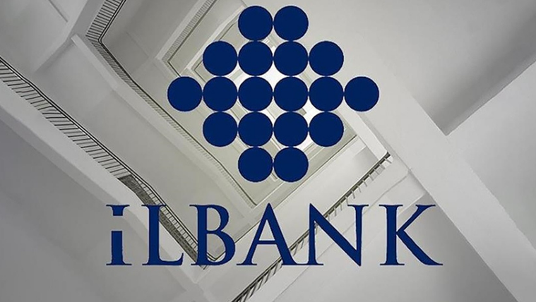 İLBANK logosu, beyaz bir arka planda mavi renkte görünmektedir.