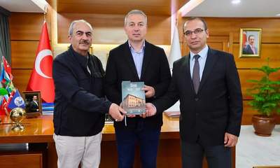 Başkan Adem Uzun’a Anlamlı Ziyaret! Genişletilmiş "Sivas" Kitabı Takdim Edildi