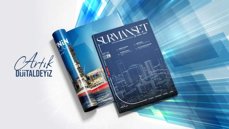 Sürmanşet dergisinin 9. sayısı, mavi ve beyaz renklerde tasarlanmış kapakla masanın üzerinde duruyor.