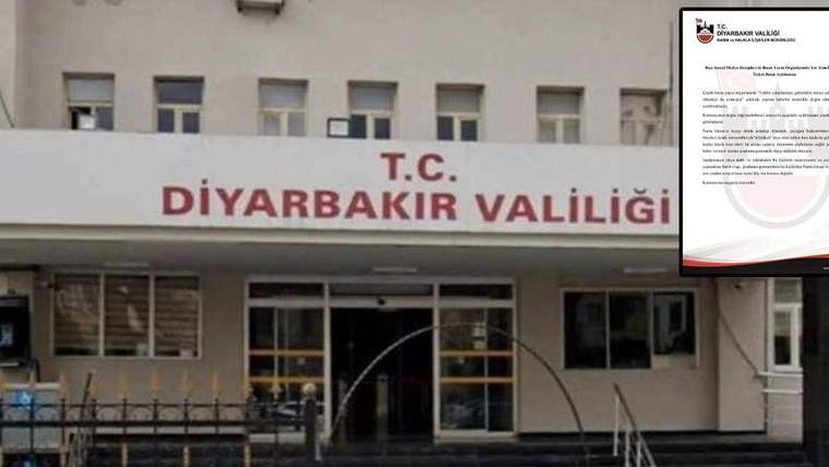 Diyarbakır Valiliği binasının önünde, tabelada 'T.C. DİYARBAKIR VALİLİĞİ' yazıyor.