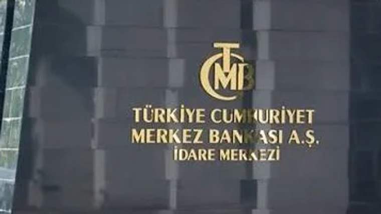 Taş duvar üzerinde Türkiye Cumhuriyet Merkez Bankası A.Ş. İdare Merkezi yazısı ve kurum logosu görülüyor.