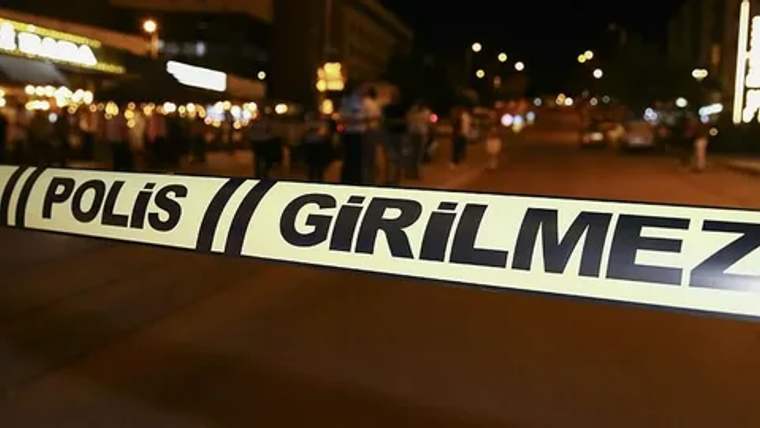 Sincan'da bir olay yeri, üzerinde 'Polis Girilmez' yazılı güvenlik şeridi var.