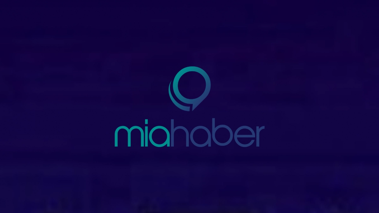 Koyu mor zemin üzerinde turkuaz ve mor renkli “mia haber” logosu yer alıyor.