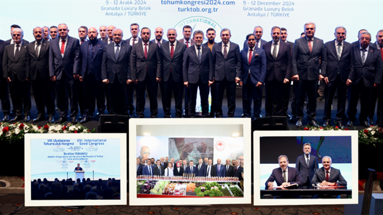 Tohumculuk sektörü temsilcileri, sahnede topluca poz veriyor; arka planda etkinlik afişleri var.