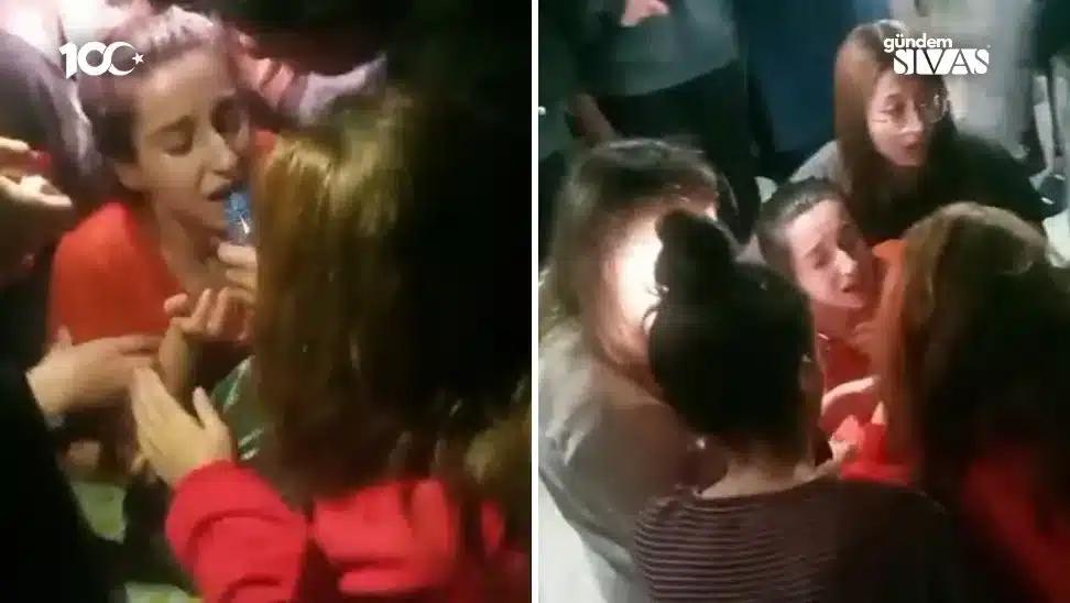 Bir grup kadın, bir kişinin etrafında toplanmış, endişeli bir şekilde konuşuyor.