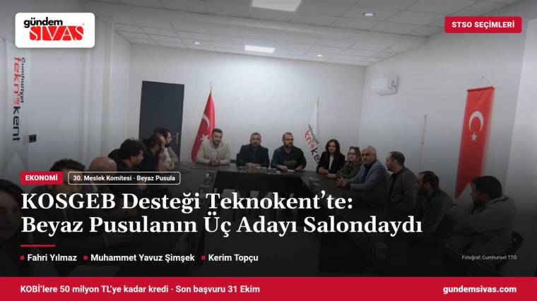 Toplantı salonunda uzun masa çevresinde oturan kişiler, Türk bayrakları ve duvar logolarıyla birlikte görülüyor.