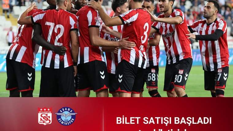 Kırmızı beyaz formalar giyen futbolcular sahada kenetlenirken, altta tribün bilet fiyatları listeleniyor.