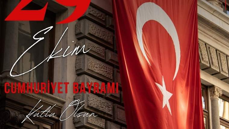 Bina cephesinde büyük bir Türk bayrağı asılı, altında 29 Ekim Cumhuriyet Bayramı yazısı yer alıyor.