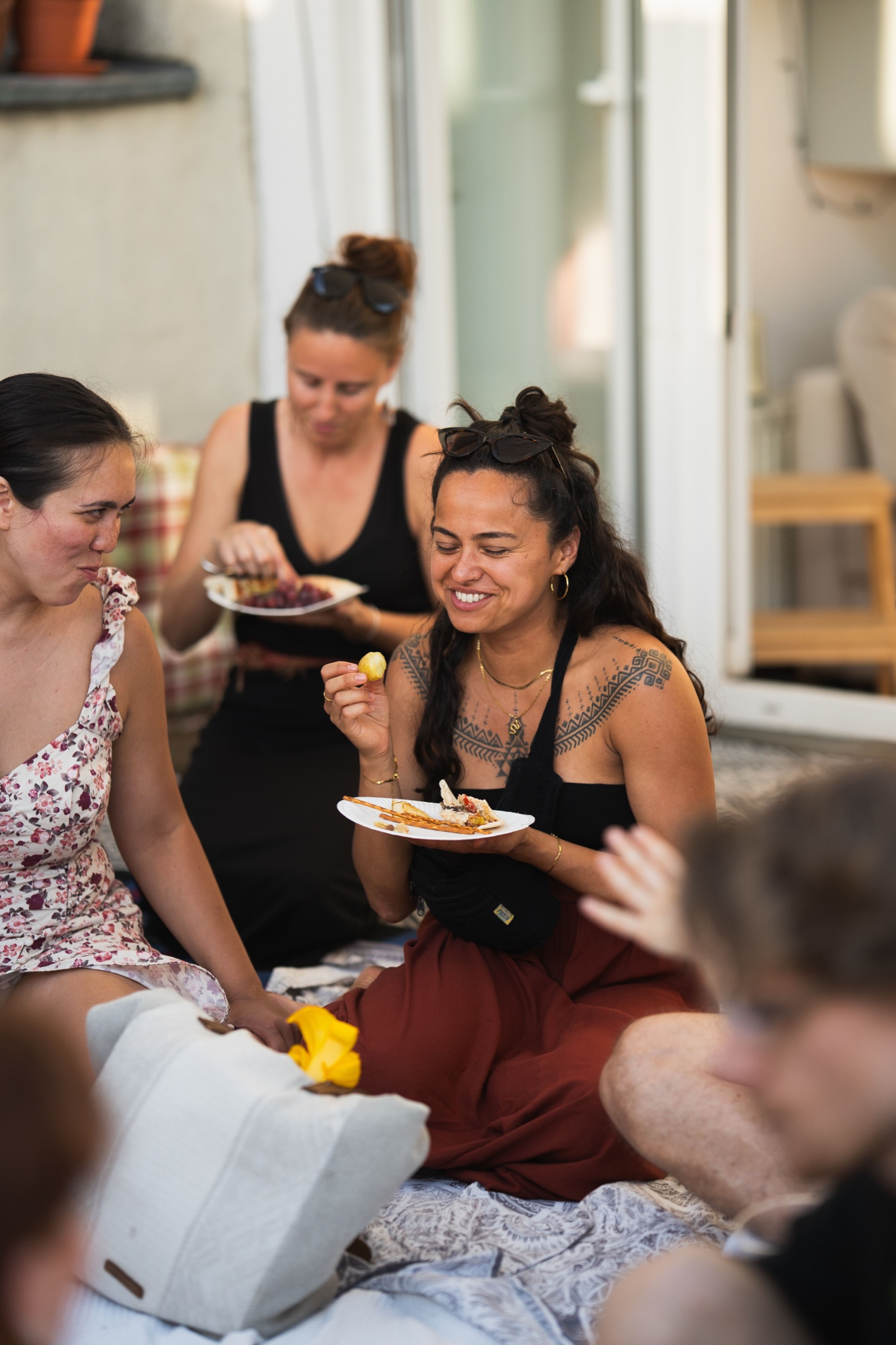 Friends sharing food and conversation before the performance