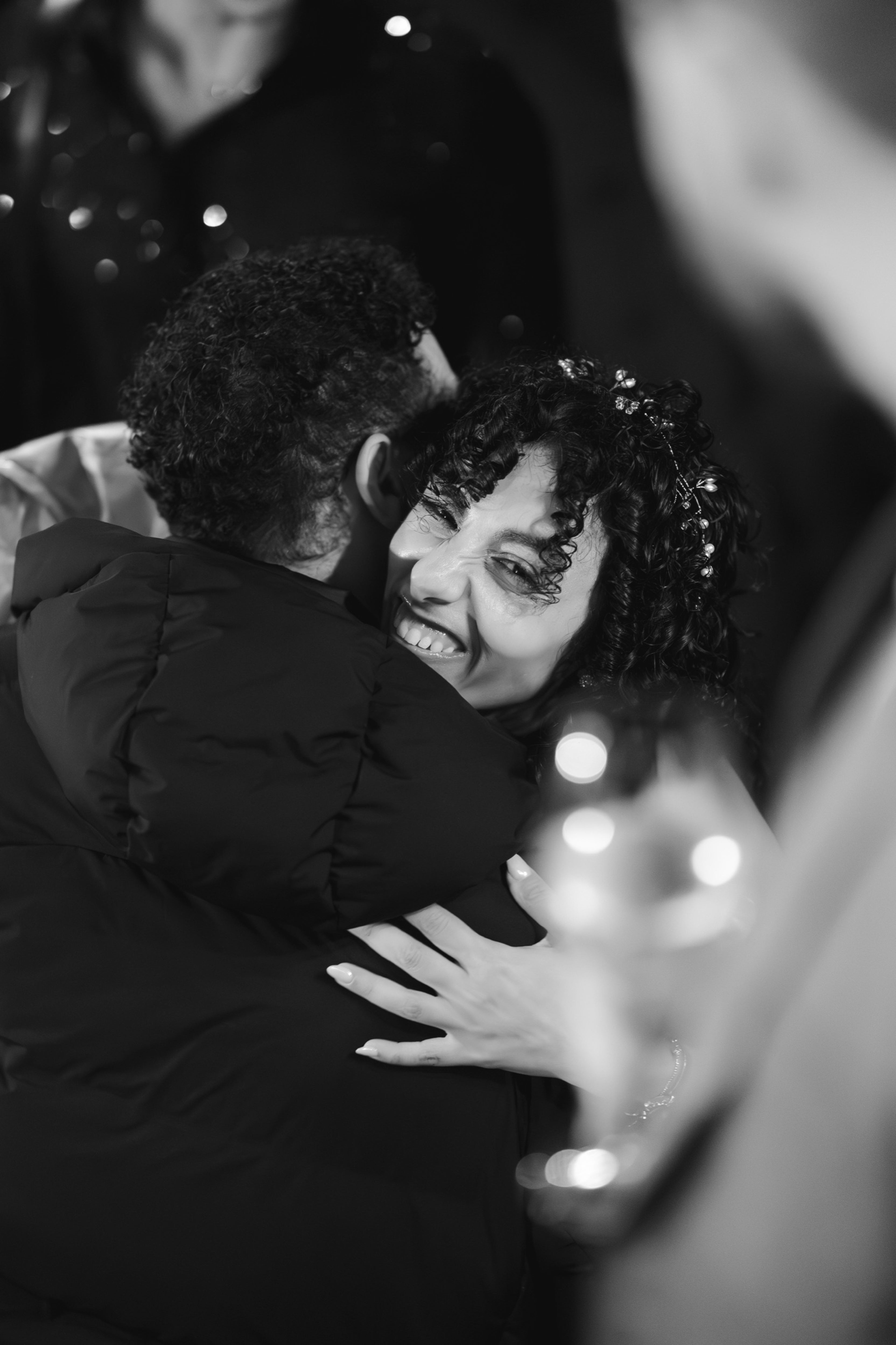 The couple sharing a close embrace on the dance floor