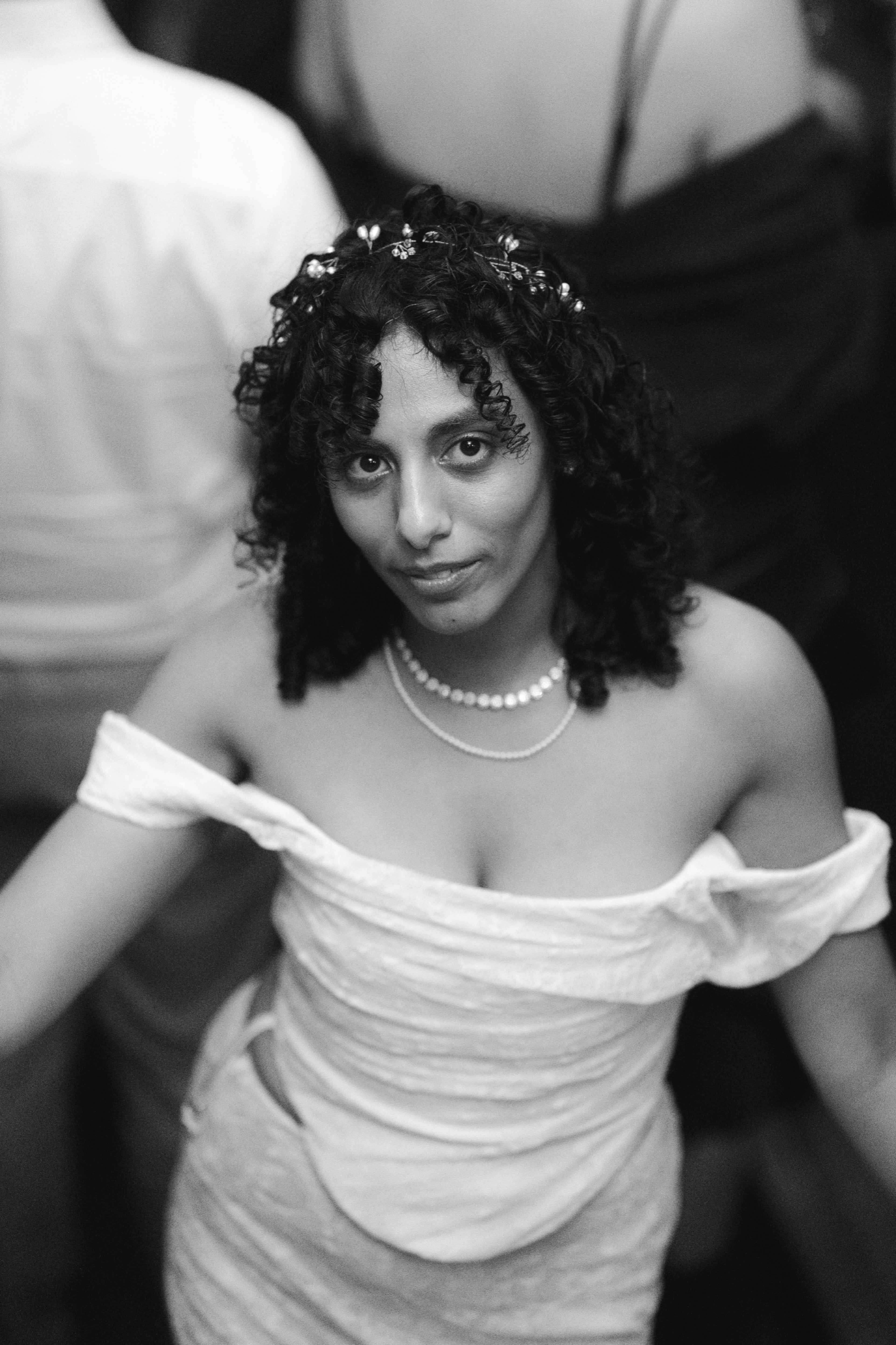 Portrait of a guest in an off-shoulder dress