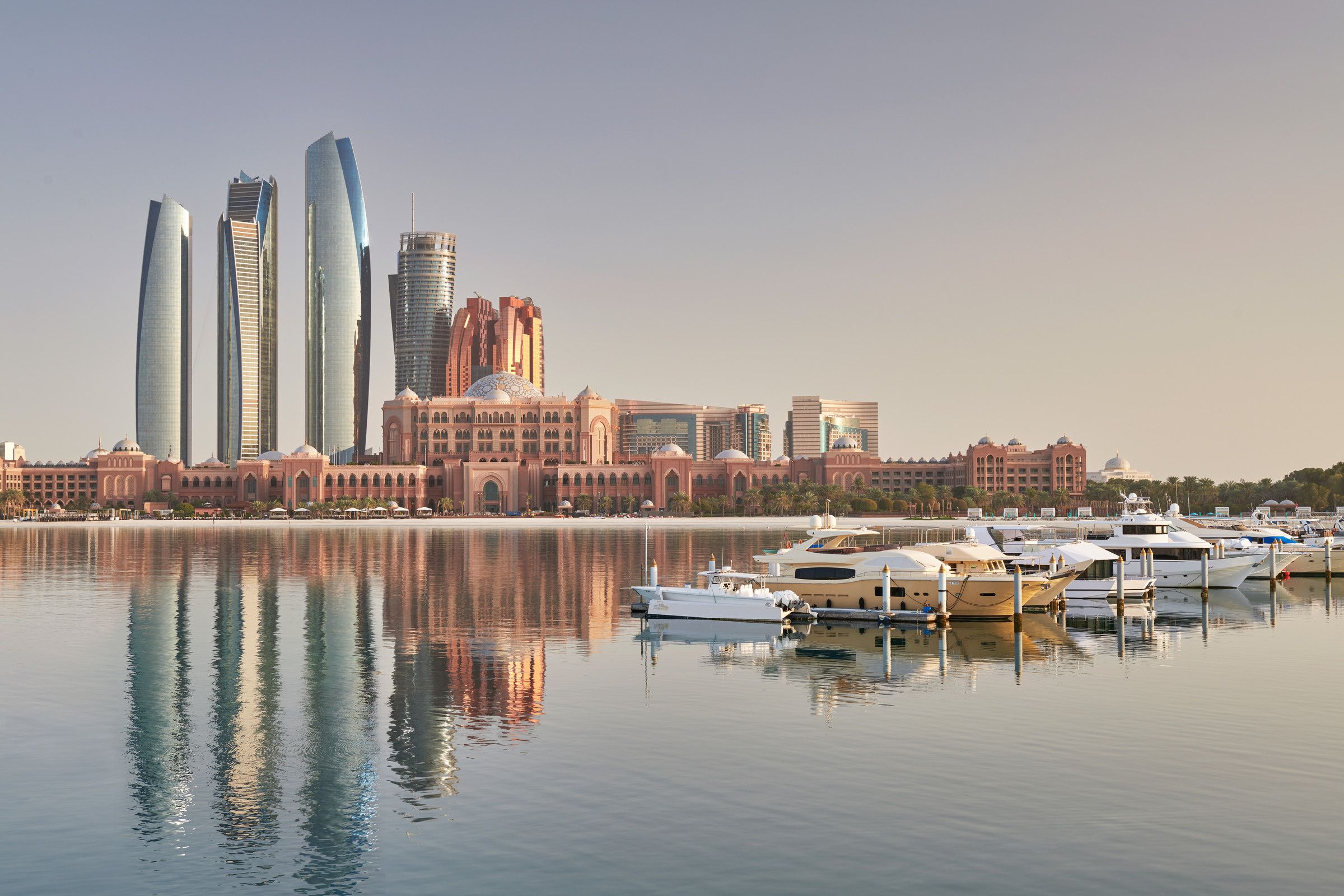 Emirates Palace and the Etihad Towers across the marina in Abu Dhabi