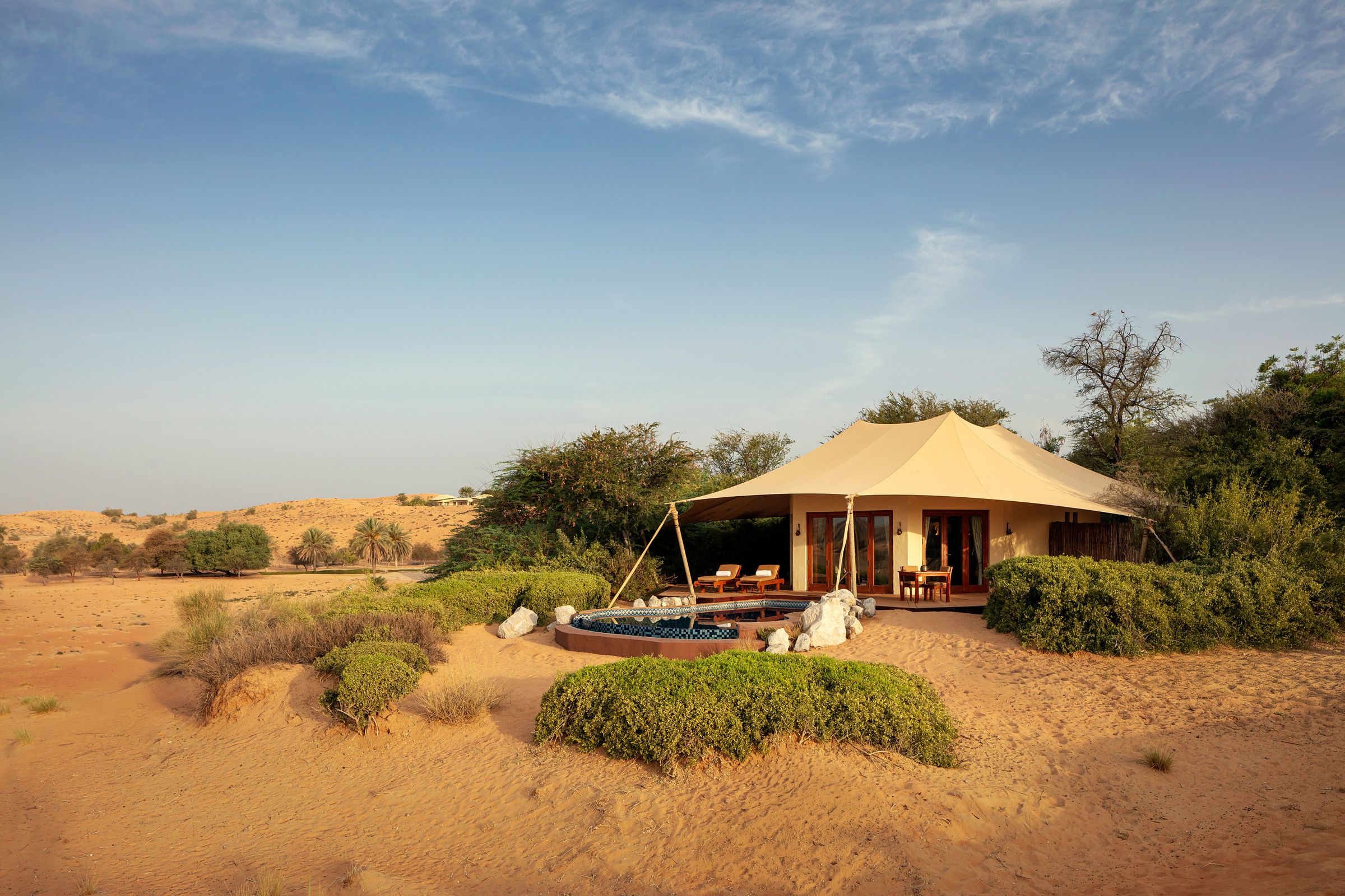 A Bedouin villa among the dunes at Al Maha