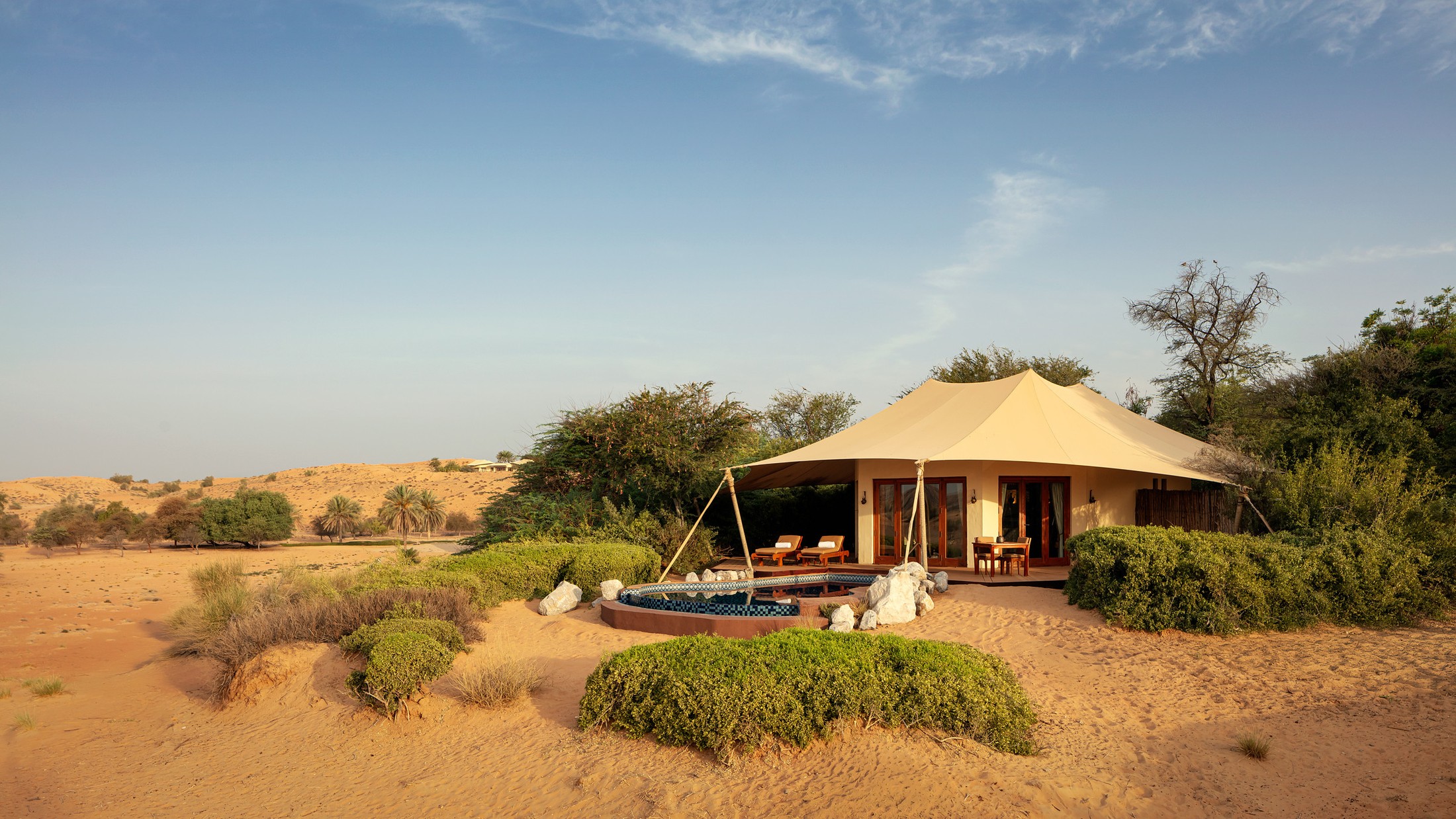 A Bedouin villa among the dunes at Al Maha