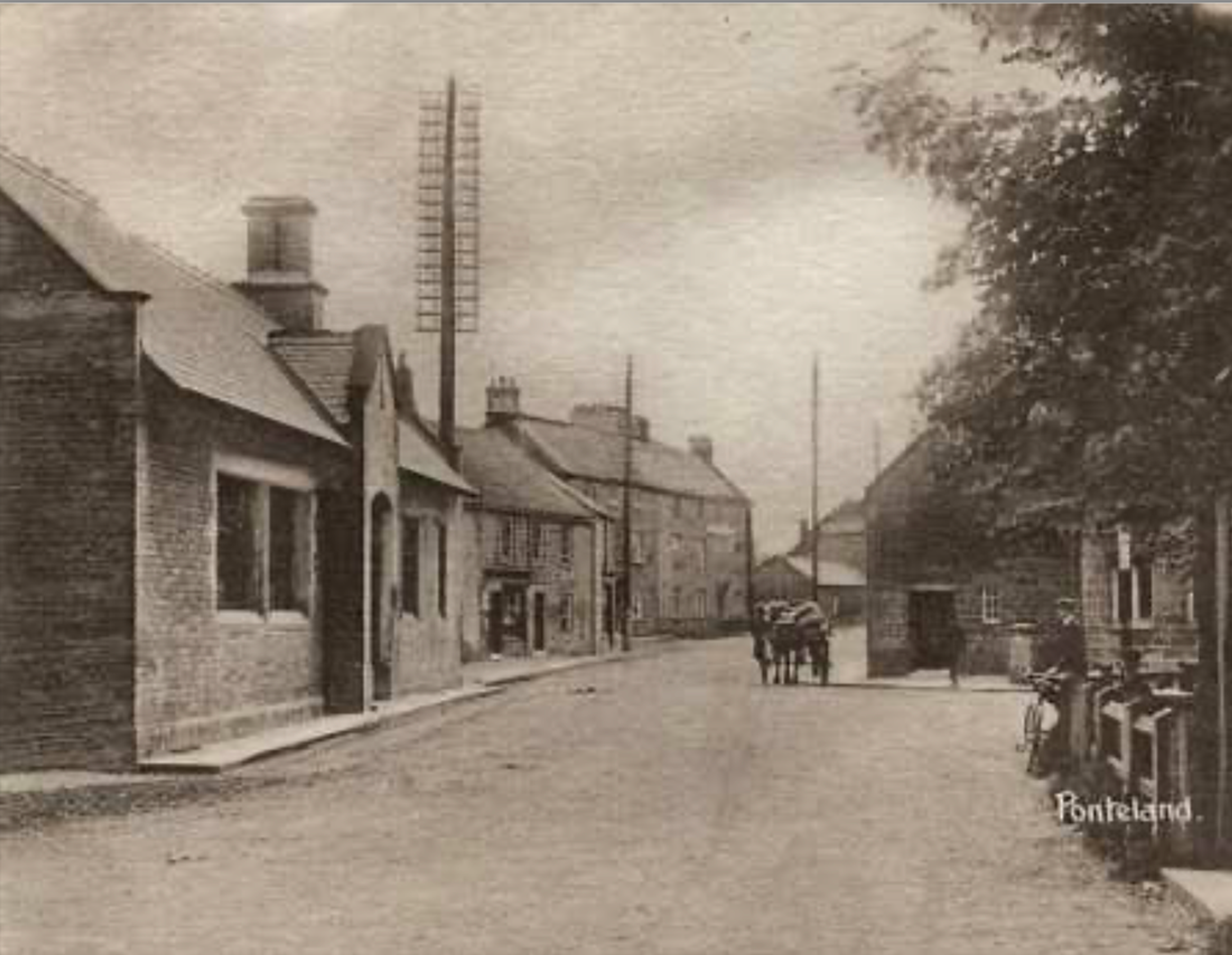 Sepia photograph of a village street with stone buildings and a tall chimney, a horse and cart in the road, captioned Ponteland